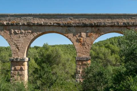 Close-up of the Arches in the Aqueduct called Devil's Bridge in Tarragona, Spain 库存照片