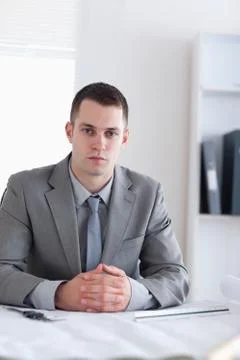 Close up of architect sitting behind a table Foto stock