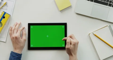 Close up of the architect work desk with a laptop and black horizontal tablet Stock-Footage 96186616
