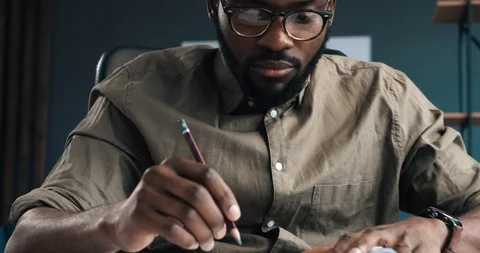 Close up of Architect`s Hands drawing blueprints in office. Engineer sketching. Видео 126235422