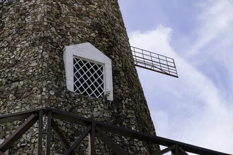 Close-up architectural detail of a rustic stone windmill tower Stock Photos