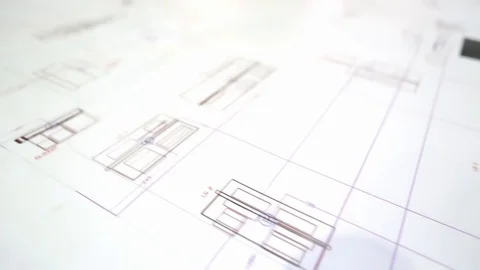 Close up of archtect pointing at building drawing on blueprint. Building project Stock-Footage 128929516