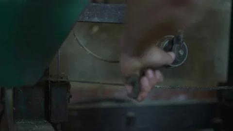 Close-Up,arm Work With a Wrench to Tighten The Screws on Twang Roller Sawmill Stock Footage 76642080
