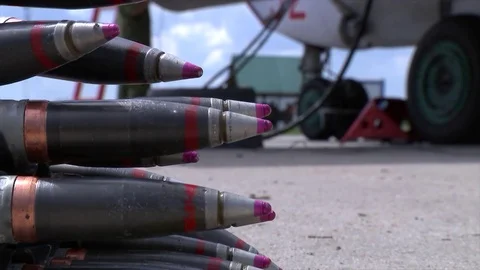 Close up of armed ammunition for military fighter aircraft Stock Footage 73497034