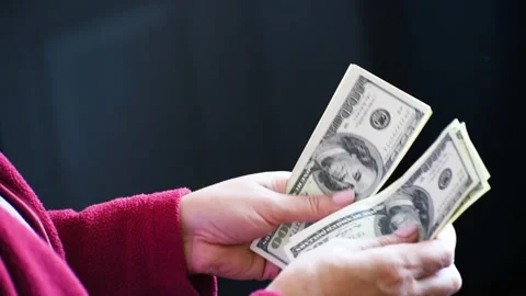 Close-up arms counting money dollars , 1000 dollars video,cash Stock Footage 166035324