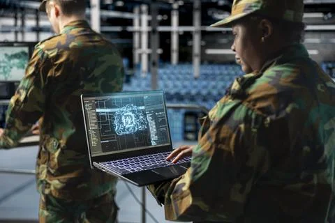 Close up of army expert in data center managing AI powered military automation 스톡 사진