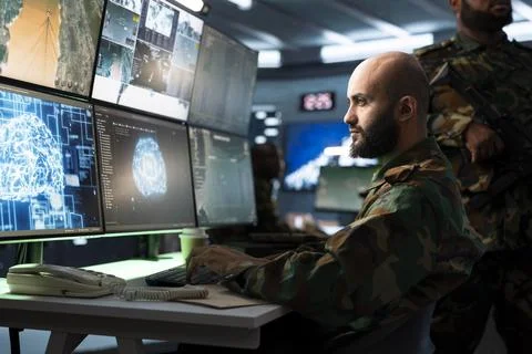 Close up of army operator using AI tech to improve military warfare systems Stock Photos