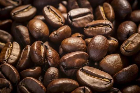  Close-up of aromatic coffee beans representing the rich taste of espresso... Stock-Fotos