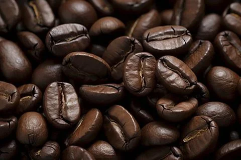  Close-up of aromatic coffee beans representing the rich taste of espresso... Stock-Fotos
