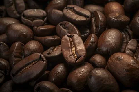  Close-up of aromatic coffee beans representing the rich taste of espresso... Stock-Fotos