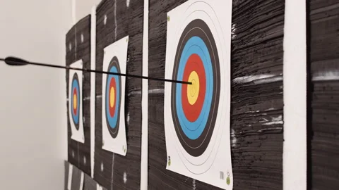 Close Up Of Arrow Hitting Target, Bull's-Eye, 3/4 Angle, Handheld, Archery 01 Stock Footage 233291526