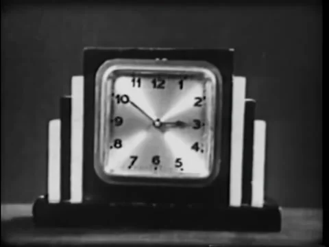 Close-up of art deco clock showing time transition Stock Footage 260255934