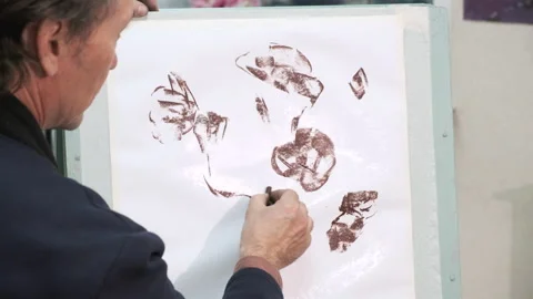 Close-up. An art school master explains painting techniques Stock Footage 144937183