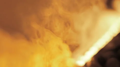 Close-up artificial electronic fireplace burning with smoke fire. Bio fireplace  Video stock 169937537