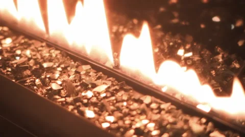 Close-up artificial electronic fireplace burning with smoke fire. Bio fireplace  Video stock 169938982