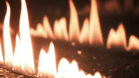 Close-up artificial electronic fireplace burning with smoke fire. Bio fireplace  Video stock 169939081