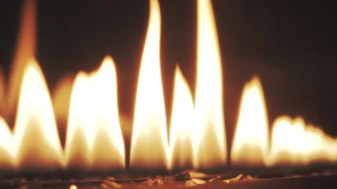 Close-up artificial electronic fireplace burning with smoke fire. Bio fireplace  Video stock 169939095