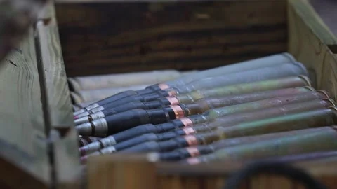 Close-Up of Artillery Shells Being Loaded into Ammunition Crate, Military Lo Stock Footage 340131469