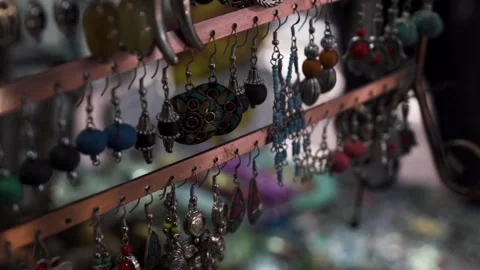 Close-up of artisan earrings in Marrakesh souk, Morocco Stock Footage 243572770