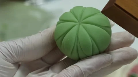 Close-Up of Artisan Hands Crafting Traditional Japanese Wagashi Confectionery Stock Footage 345293601