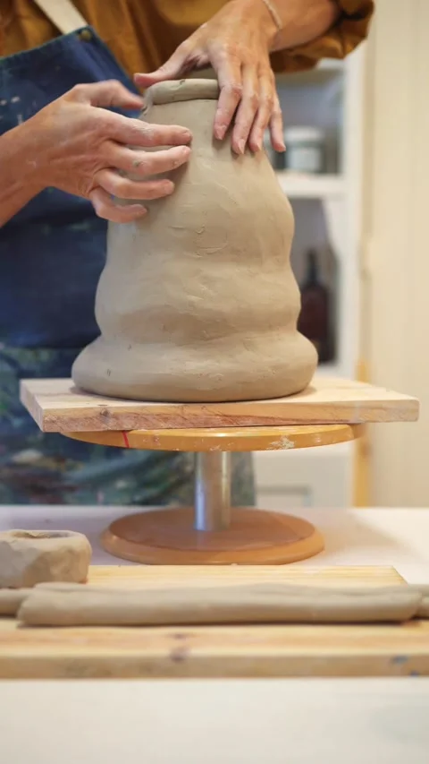 Close-up of an artist 's hands crafting pottery Video stock 306978161