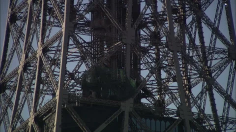 Close-up ascending scan of girders of the Eiffel Tower, Paris Stock Footage 59334705