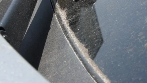 Close up of ash on car window after brush fire Stock Footage 137532658