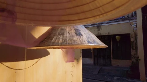 Close up of Asian conical bamboo hat with  decoration of Hoi An Stock Footage 113791486