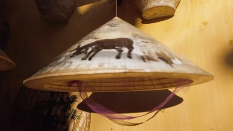 Close up of Asian conical bamboo hat with  decoration of Hoi An Stock Footage 113791503