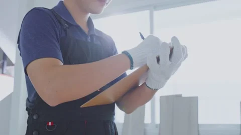 Close up of Asian construction worker check renovation of corridor in house. Stock Footage 167850239