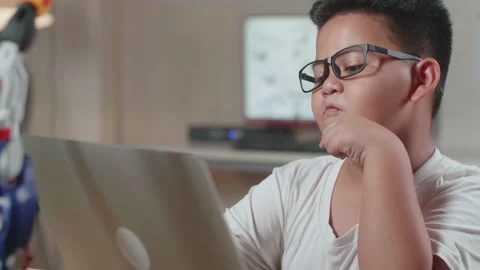 Close Up Of Asian Cute Boy Thinking While Working About A Cyborg Hand Stock Footage 212020107