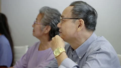 Close-up, Asian elderly man contemplating at a meeting Stock Footage 220637586
