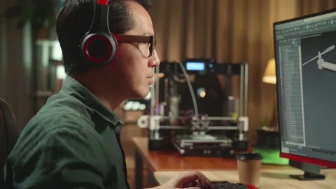 Close Up Of Asian Engineer Start Work On Personal Computer And 3D Printer Stock Footage 158106071