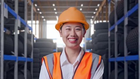 Close Up Of Asian Female Engineer Crossing Her Arms Smiling To Camera Tire Stock Footage 341788400