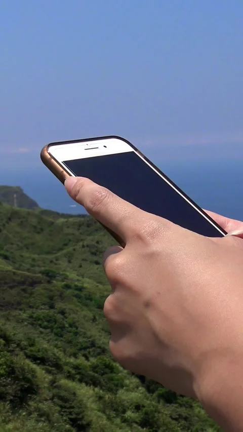 Close up asian hands woman using a smartphone in beutiful mountain Taiwan Stock Footage 317577530