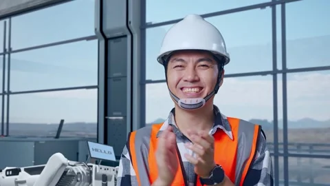 Close Up Of Asian Male Engineer Smiling And Clapping Hands in High Tech Factory Stock Footage 274359716