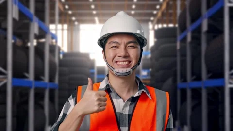 Close Up Of Asian Male Engineer Smiling And Showing Thumbs Up Gesture Tire Stock Footage 341787149