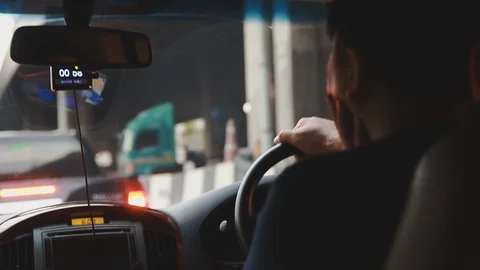 Close up of Asian man driving through traffic congestion in Bangkok, Thailand Video stock 107480167