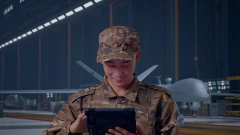 Close Up Of Asian Man Soldier Using A Tablet , Military Drone Stock Footage 314938033