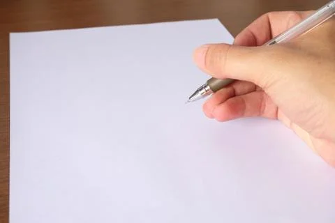 Close up of Asian Men hand that holding pen for writing Stock Photos