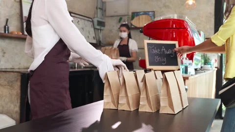 Close up Asian Waitress Preparing take away food while customer choose order fro Stock Footage 146471188