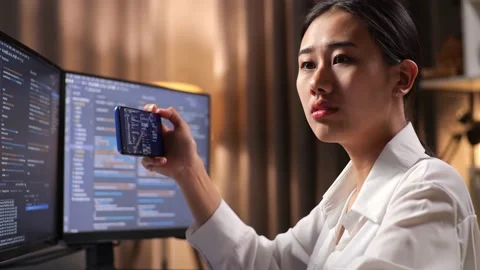 Close Up Of Asian Woman Programmer Looking At Desktop Computer Screen Stock Footage 232034721