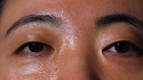 Close up of Asian woman's eyes blinking Stock Footage 149385133