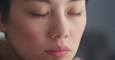 Close up of Asian woman's face Vídeo Stock 42591135