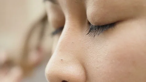 Close up of an Asian woman's face Stock Footage 81532468