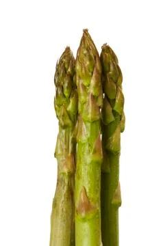 CLOSE UP OF ASPARAGUS TIPS ON WHITE BACKGROUND Stock Photos
