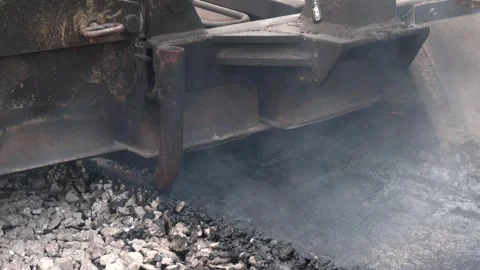Close-Up of Asphalt Paver Laying Hot Asphalt Stock-Footage 344332212