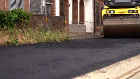 Close Up of Asphalt Road Roller with Smooth Pan Motion – 4K Stock Footage 311072984
