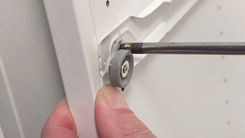 Close-up of assembling furniture with a screwdriver Видео 337420106