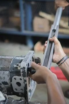 Close up Assembly and installing Gear pump Stock Photos